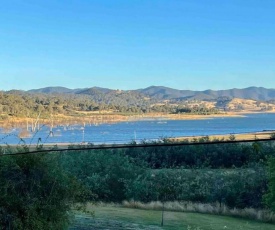 Relax in the spa with views opposite Lake Eildon